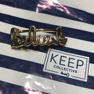 KEEP Collective gold “believe” charm